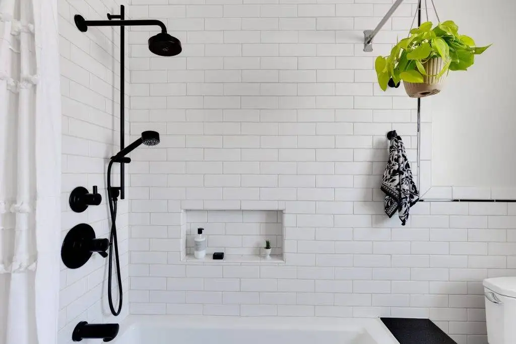 Remodeled shower with updated tile and fixtures