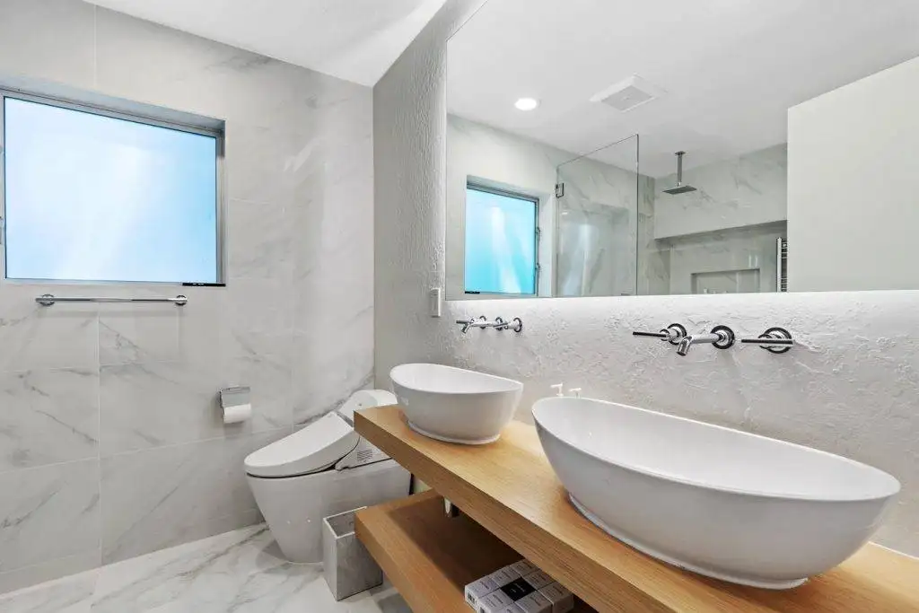 Remodeled bathroom showcasing updated fixtures and finishes