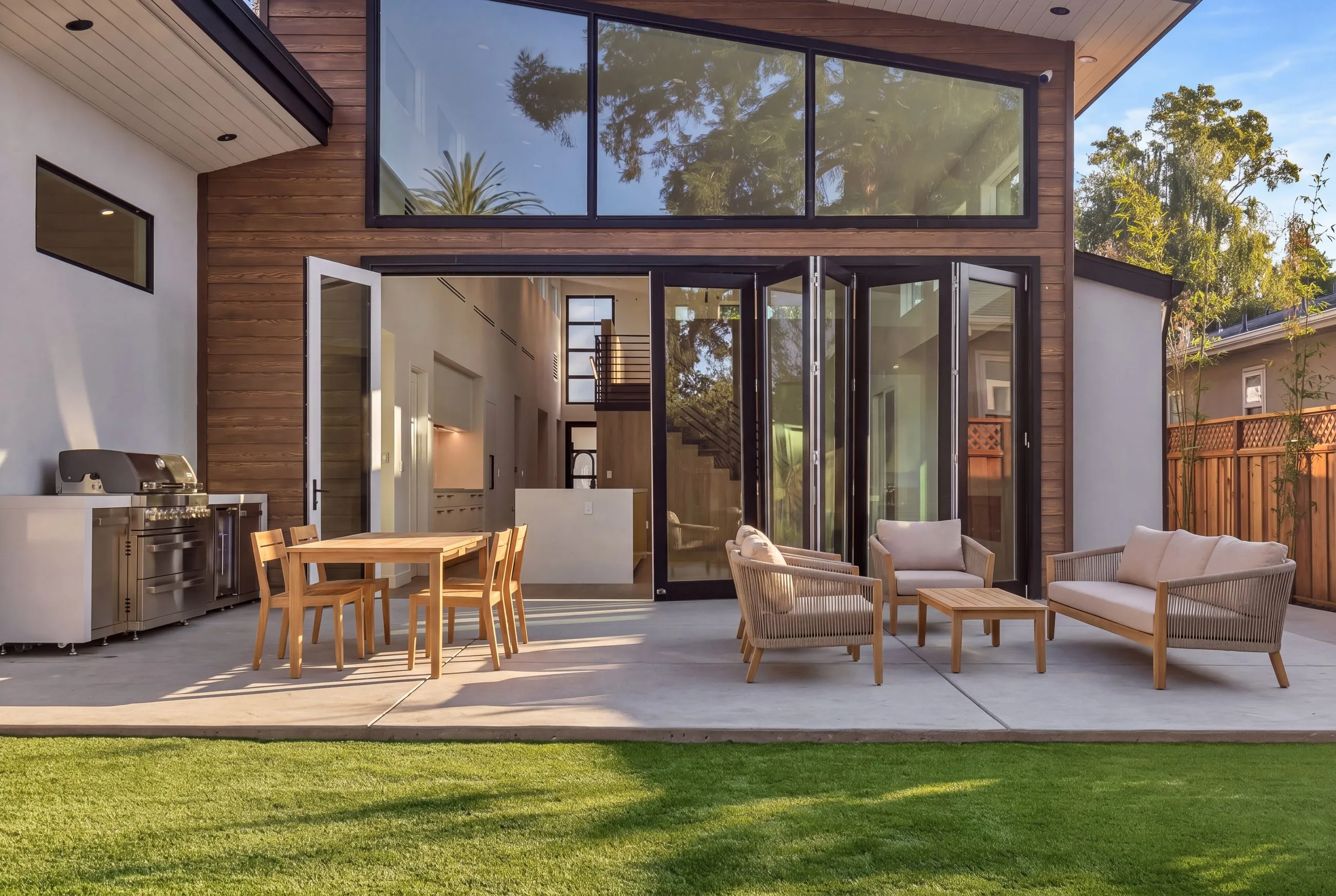 Stockbridge, a new build in Atherton by Greenberg, the rear elevation and pool at dusk