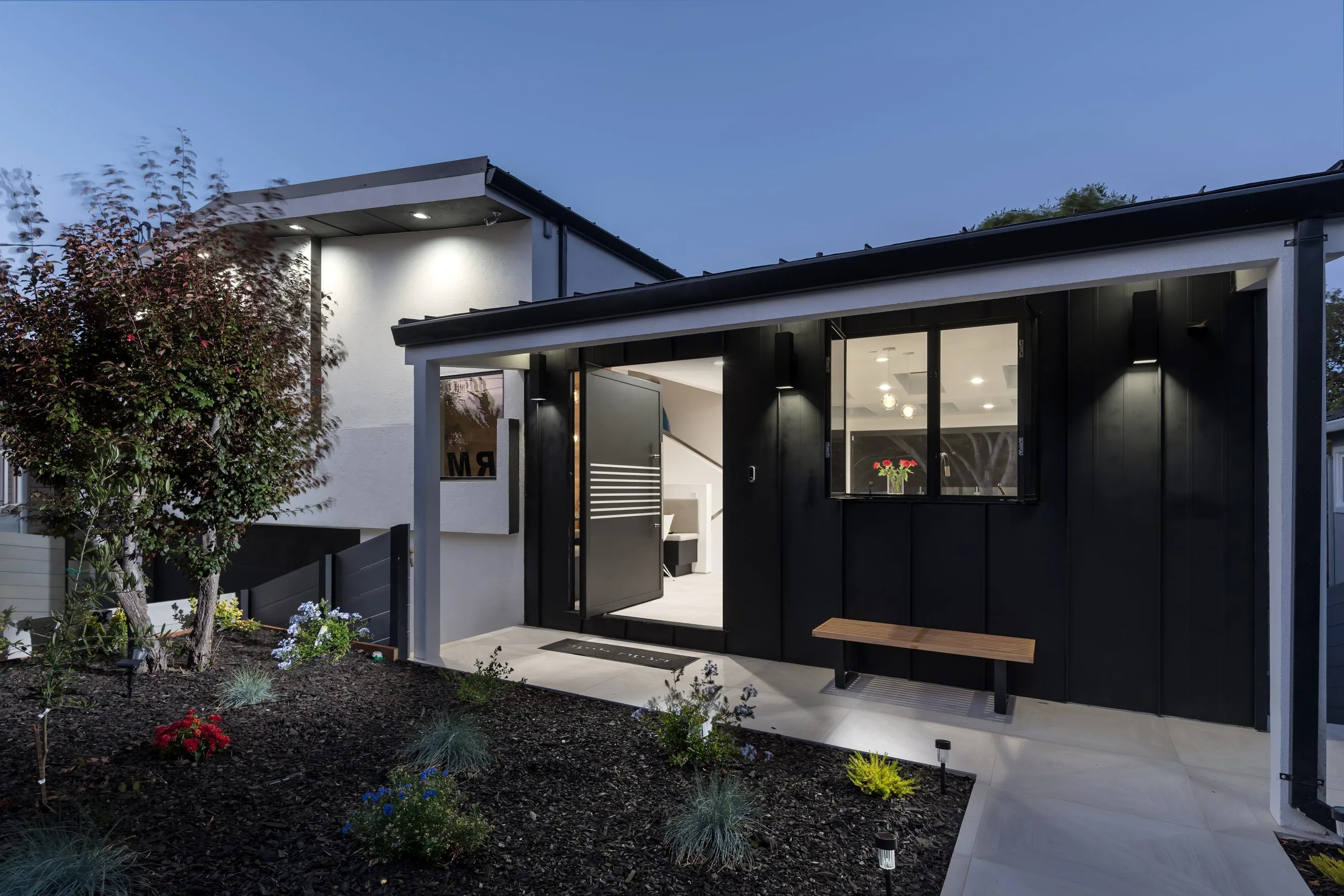 Thurm Avenue, a remodel in Belmont by Greenberg, the street elevation at dusk