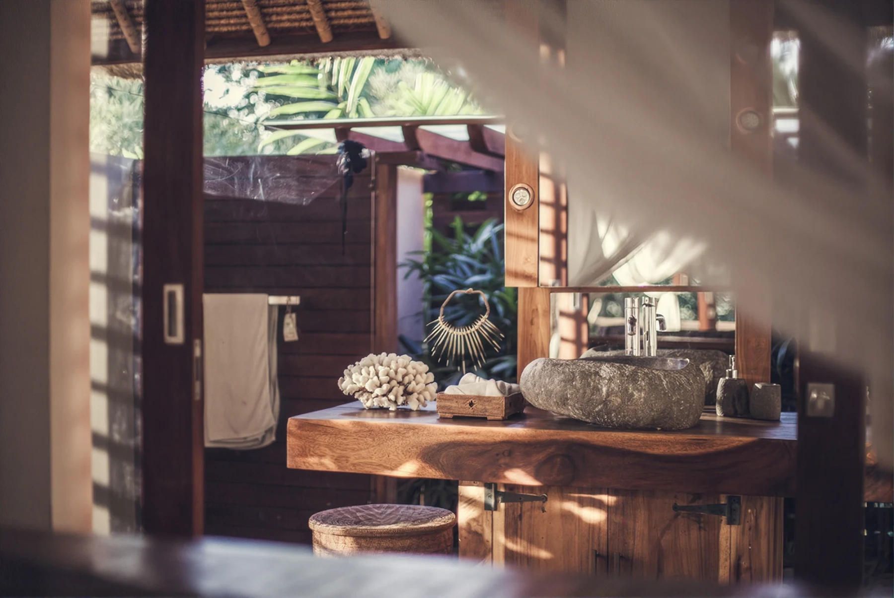 Open-air vanity with a stone basin