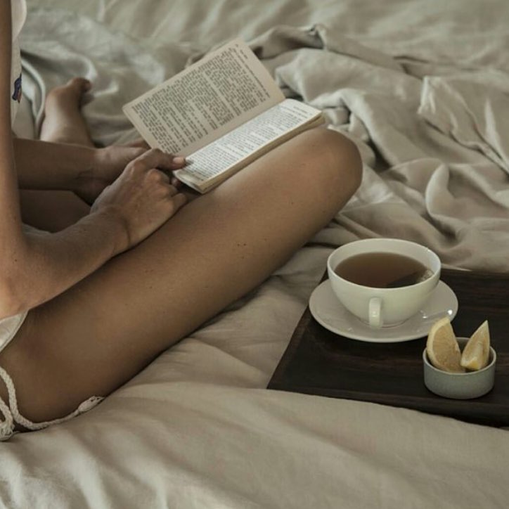 Morning coffee and a book in bed