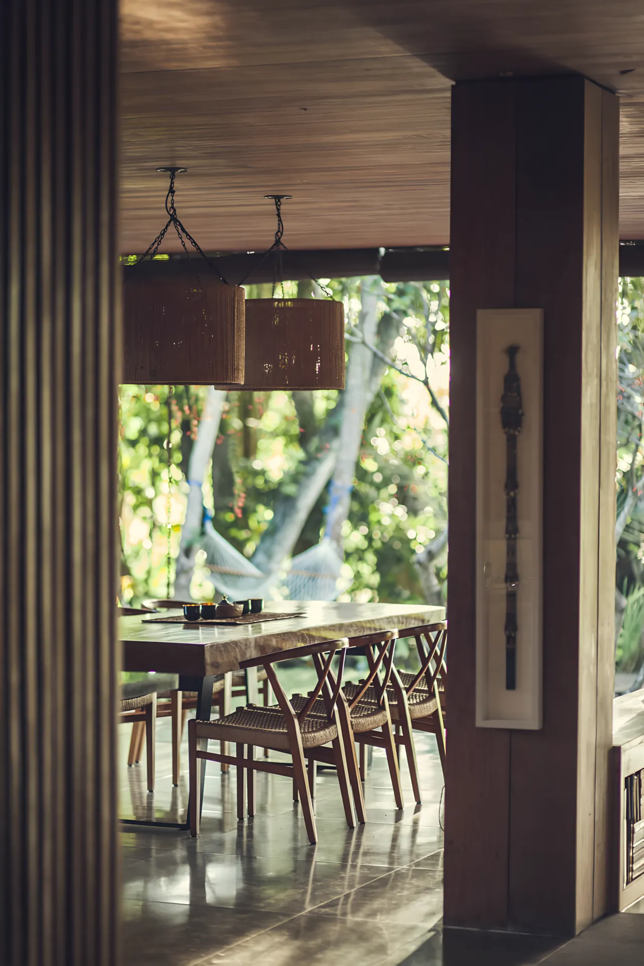 Dining table set beneath the pendant lights