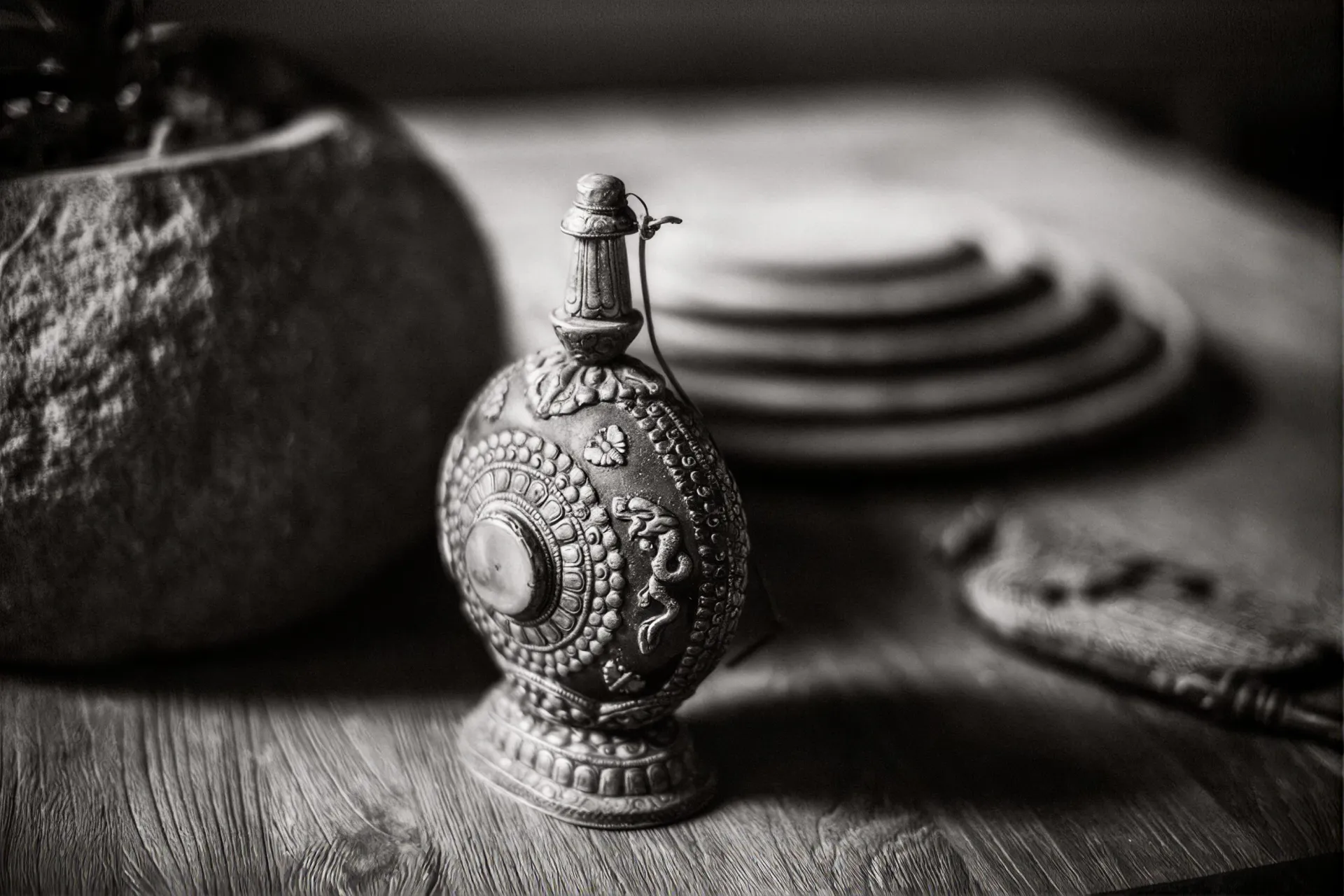 Engraved silver vessel on the sideboard