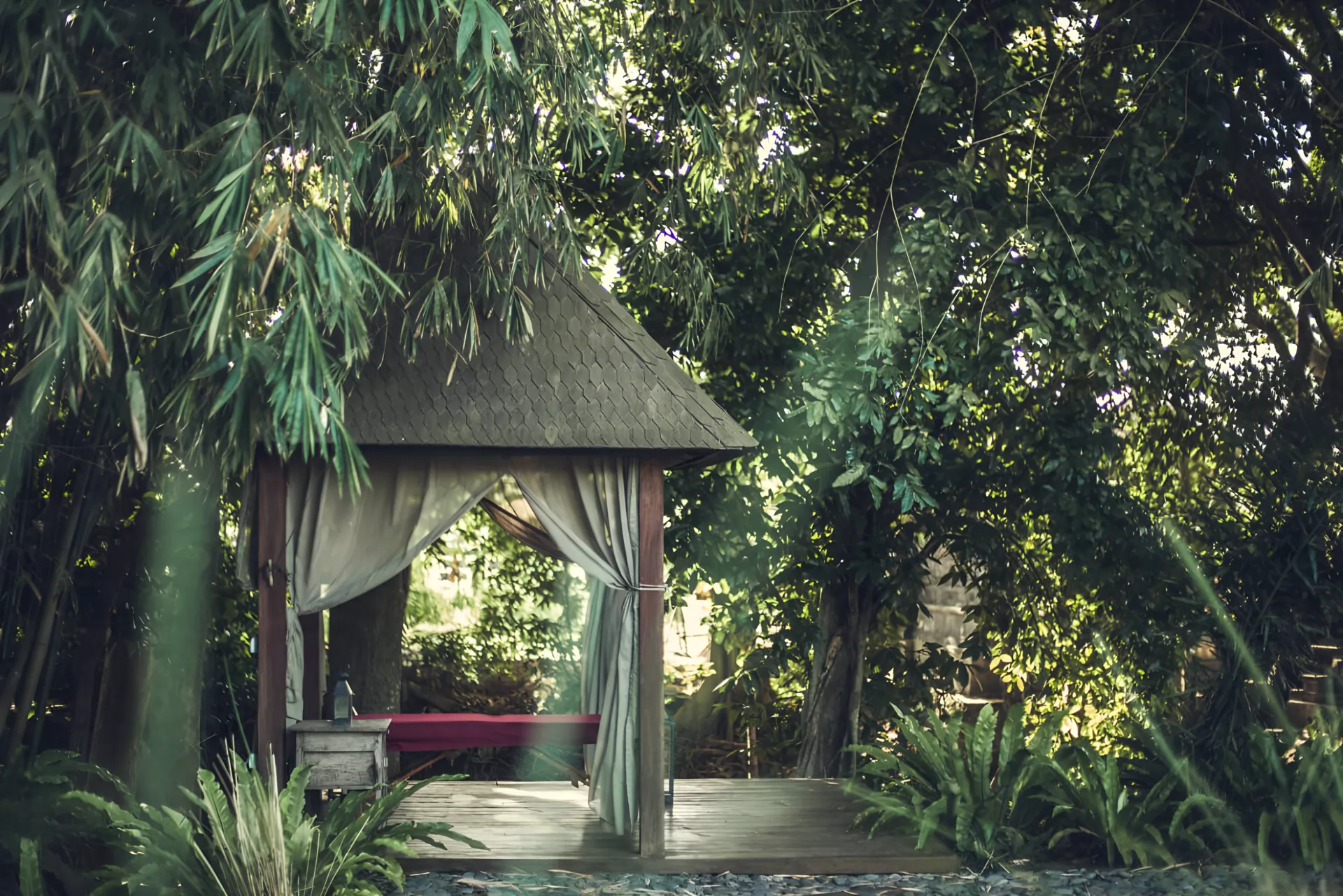 Open bale set among the garden trees