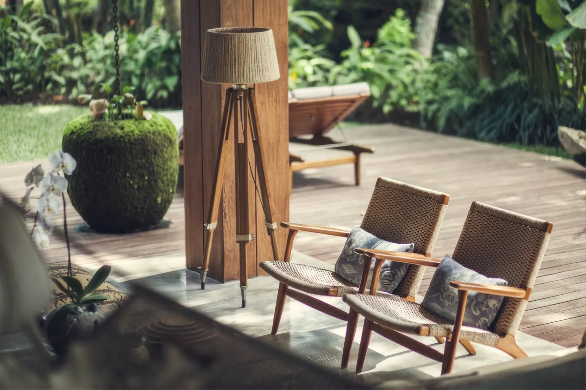 Teak chairs on the shaded deck