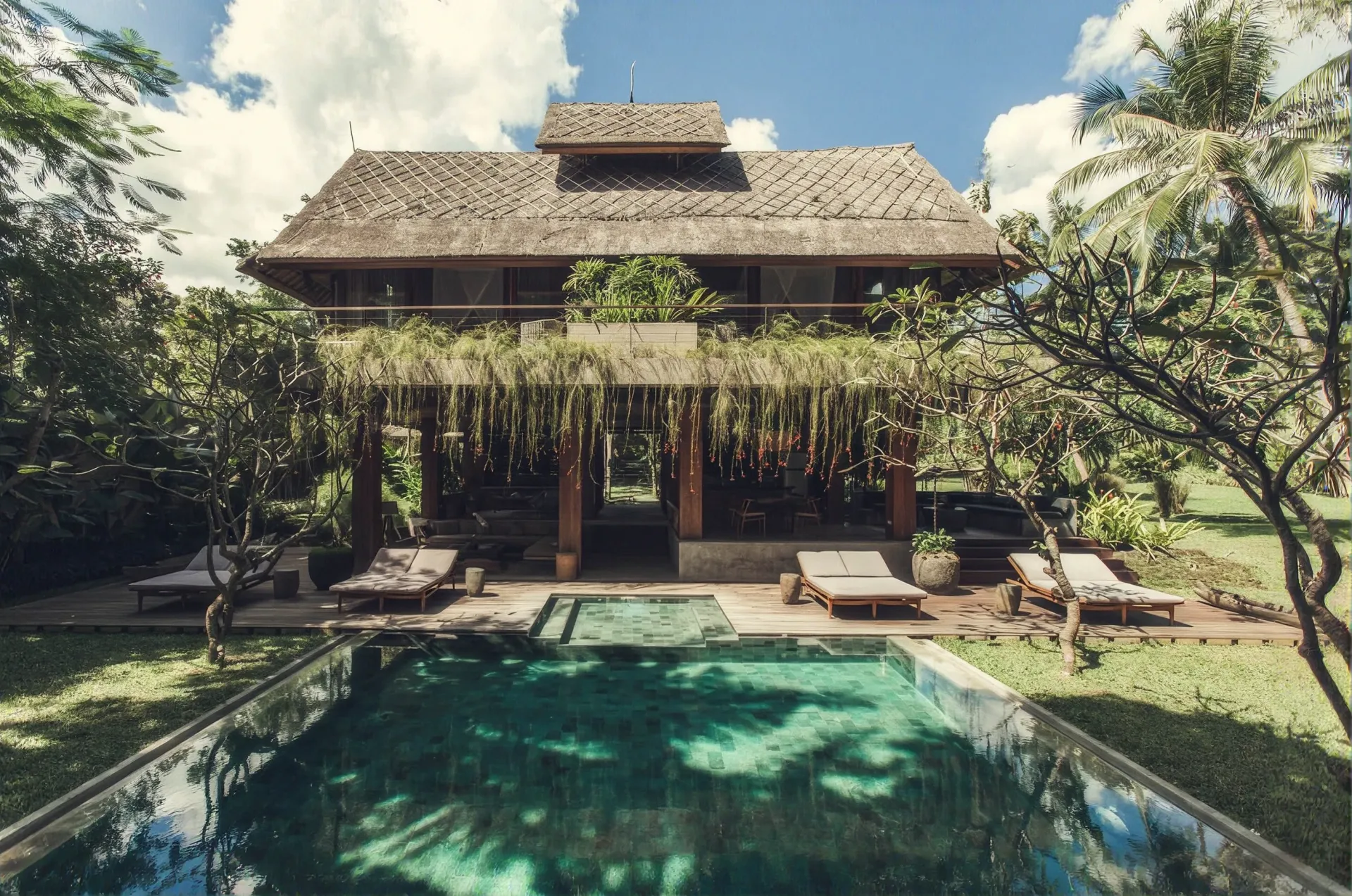 Villa and pool among the palms