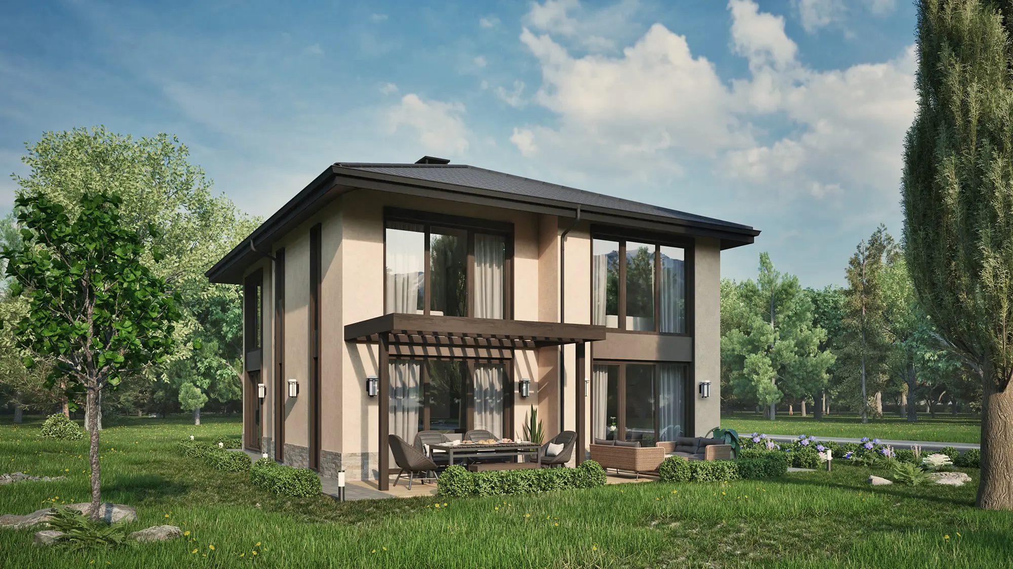 Modern two-story house with beige exterior, large windows, and a patio with outdoor seating surrounded by green lawn and trees under a partly cloudy sky.