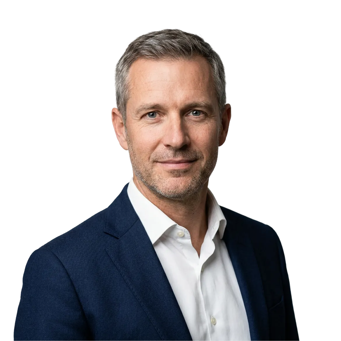 Middle-aged man with short gray hair wearing a white shirt and navy blazer, looking confidently at the camera with a slight smile.