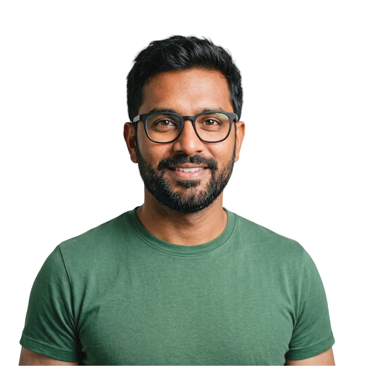 Smiling man with black hair, beard, black glasses, and wearing a green t-shirt against a plain background.