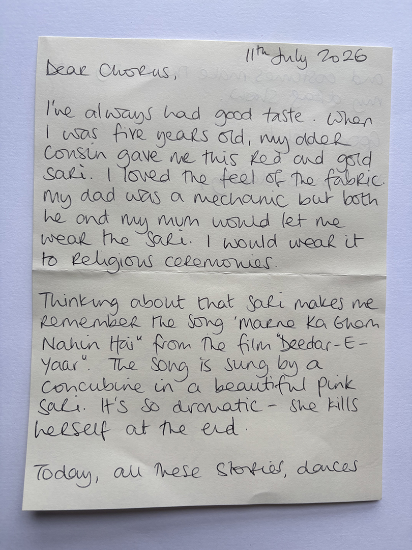 Handwritten letter dated 11th July 2026, addressed to 'Dear Chorus,' describing a childhood memory of receiving a red and gold sari from an older cousin, and the writer's parents allowing them to wear it to religious ceremonies. The letter recalls the song 'Maane Ka Gham Nahin Hai' from the film 'Deedar-E-Yaar,' sung by a concubine in a pink sari, ending tragically. The letter is written in black ink on light paper.