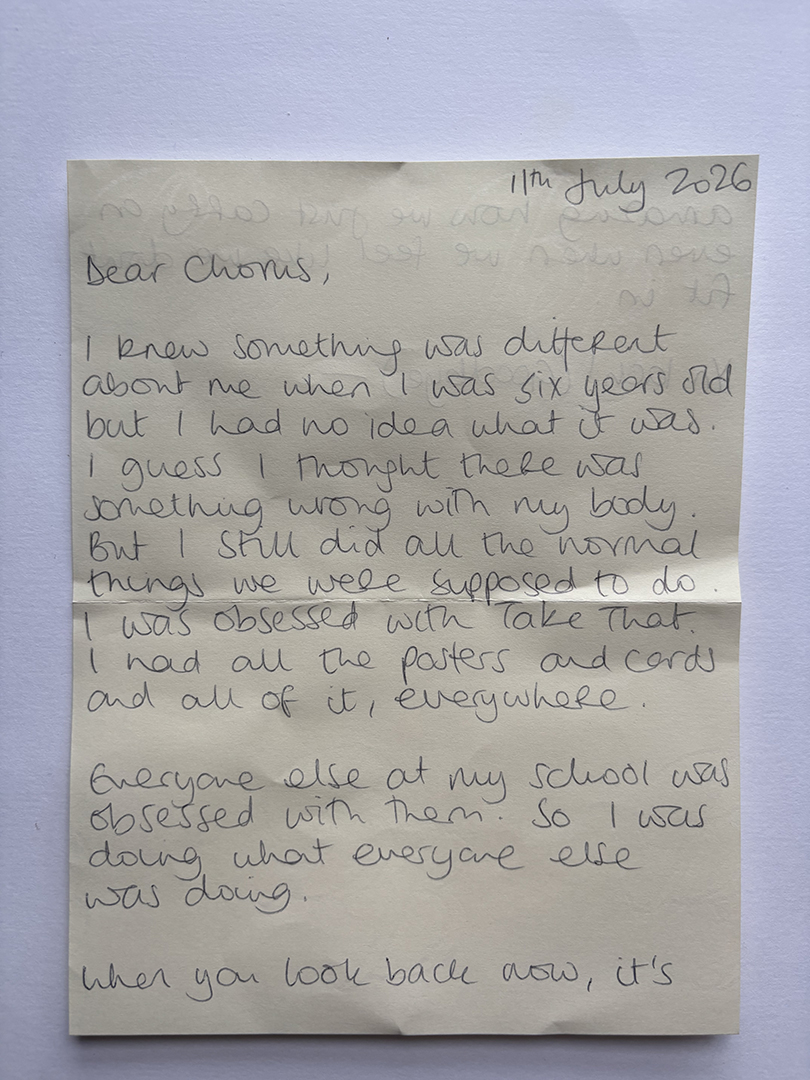 Photograph of a handwritten letter dated 11th July 2026, starting with 'Dear Chorus,' and describing childhood feelings of being different, obsession with the music group Take That, and following what others at school were doing.