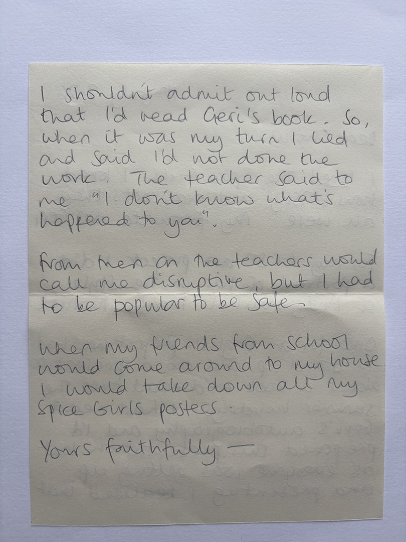 Photograph of a handwritten note on a yellowish paper. The note talks about not admitting to reading Geri's book, lying about not doing work, a teacher's comment about changed behavior, being called disruptive by teachers but needing popularity for safety, and removing Spice Girls posters when friends visited. The note ends with 'Yours faithfully'.