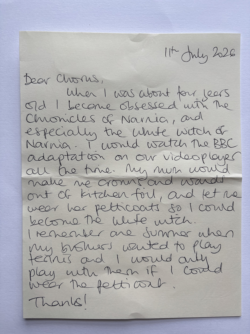 Handwritten letter dated 11th July 2026 describing the author's childhood obsession with The Chronicles of Narnia, especially the White Witch, mentioning watching the BBC adaptation and dressing up with crowns, wands, and petticoats made by their mother to become the White Witch, and recalling playing tennis only while wearing the petticoats.