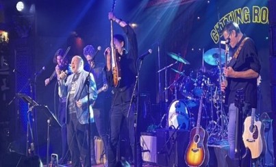 Anderson parents performing on stage at the Music Benefit