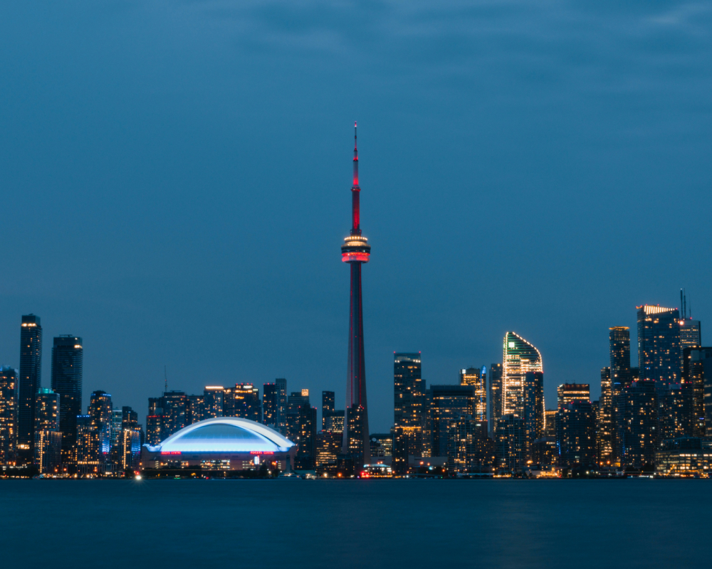 The Toronto skyline at dusk, with the CN Tower at its centre