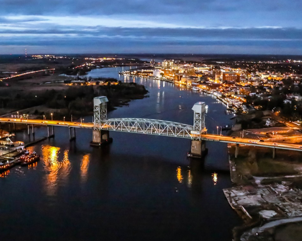 The low Wilmington riverfront skyline at dusk