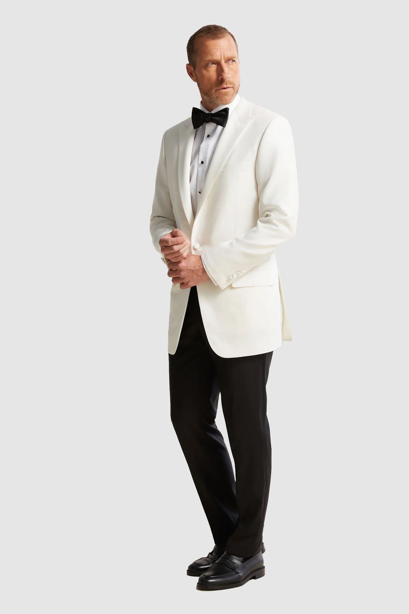 Wedding tailoring detail with boutonniere