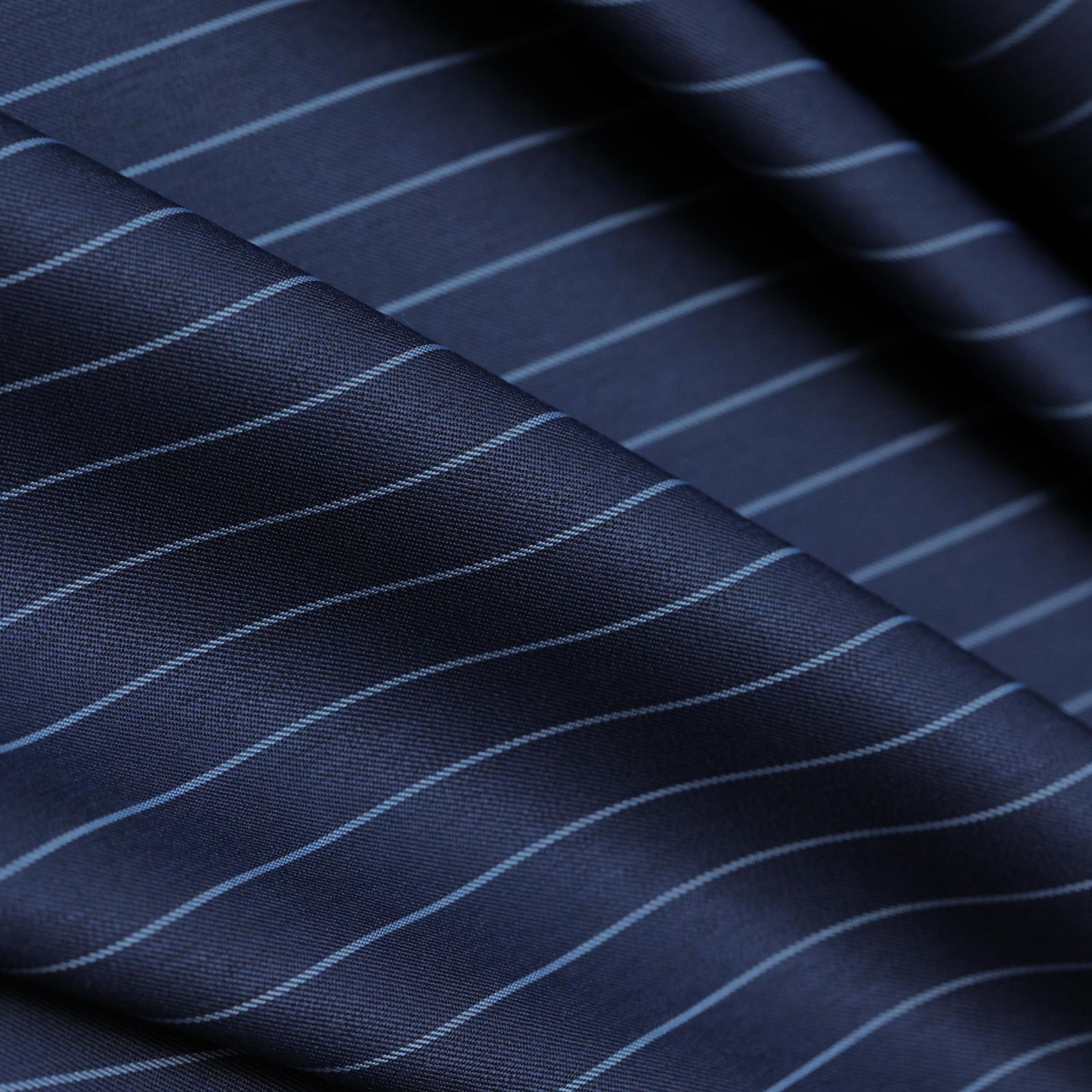 Close-up of navy pinstripe suiting fabric