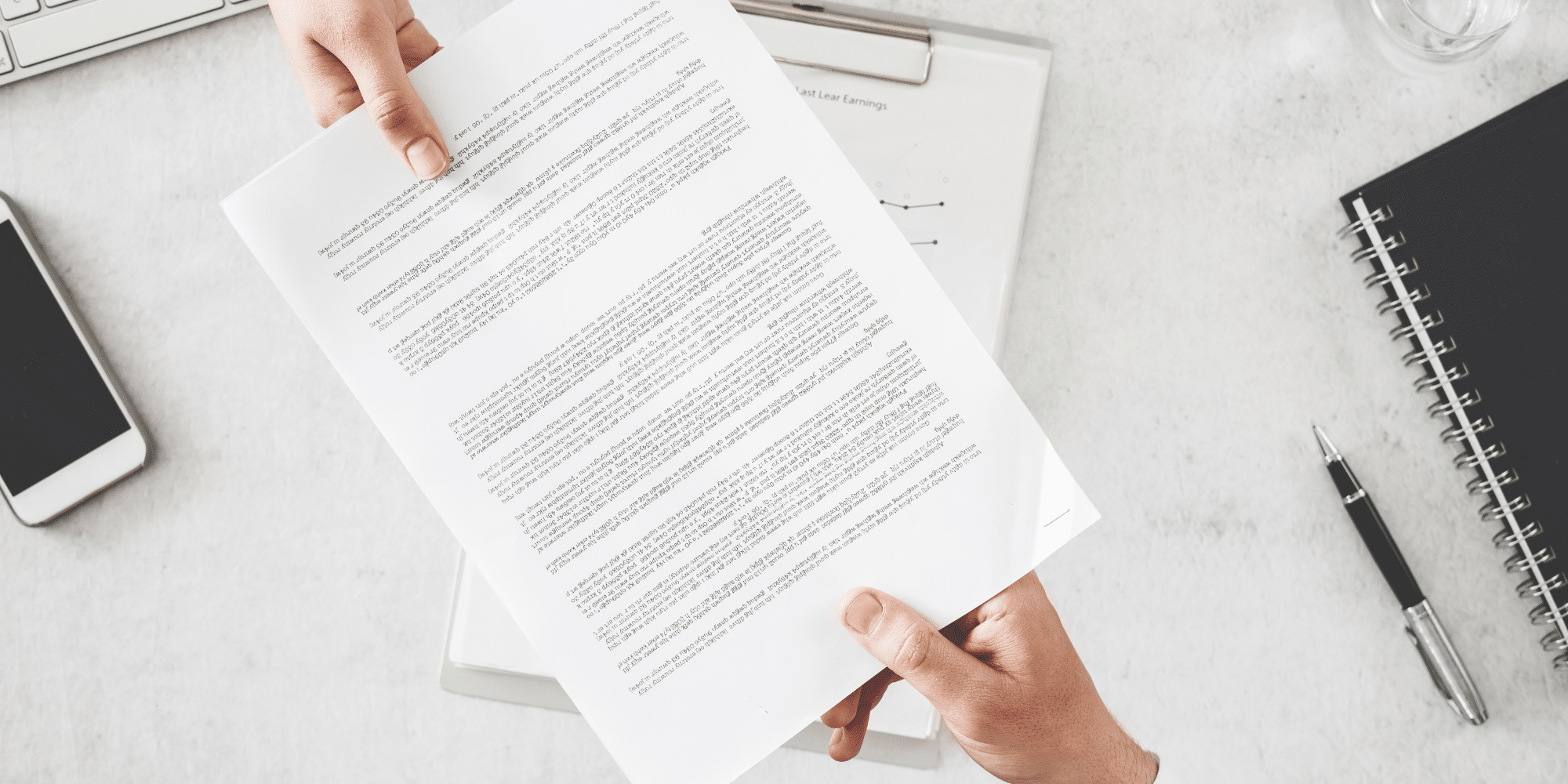 man handing out documents - How to Dissolve an LLC in Tennessee