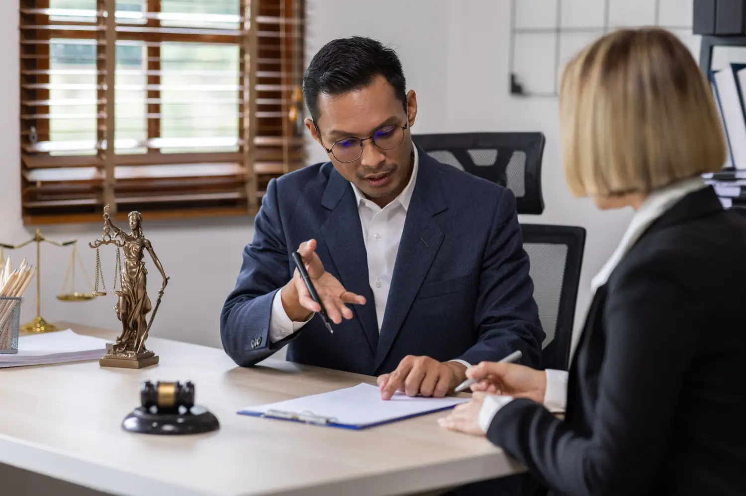 person reviewing documents - How to Dissolve an LLC in Tennessee
