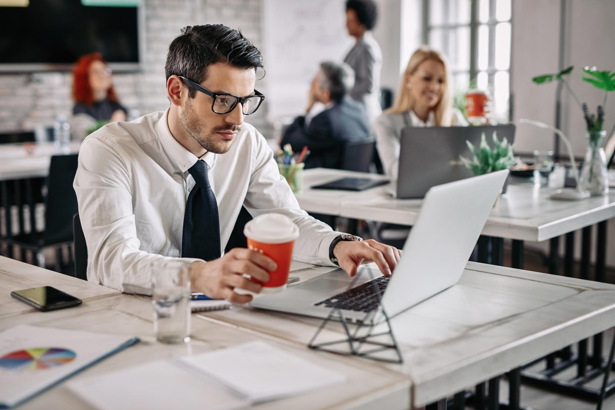 man wearing glasses - How to Dissolve a Corporation in Delaware