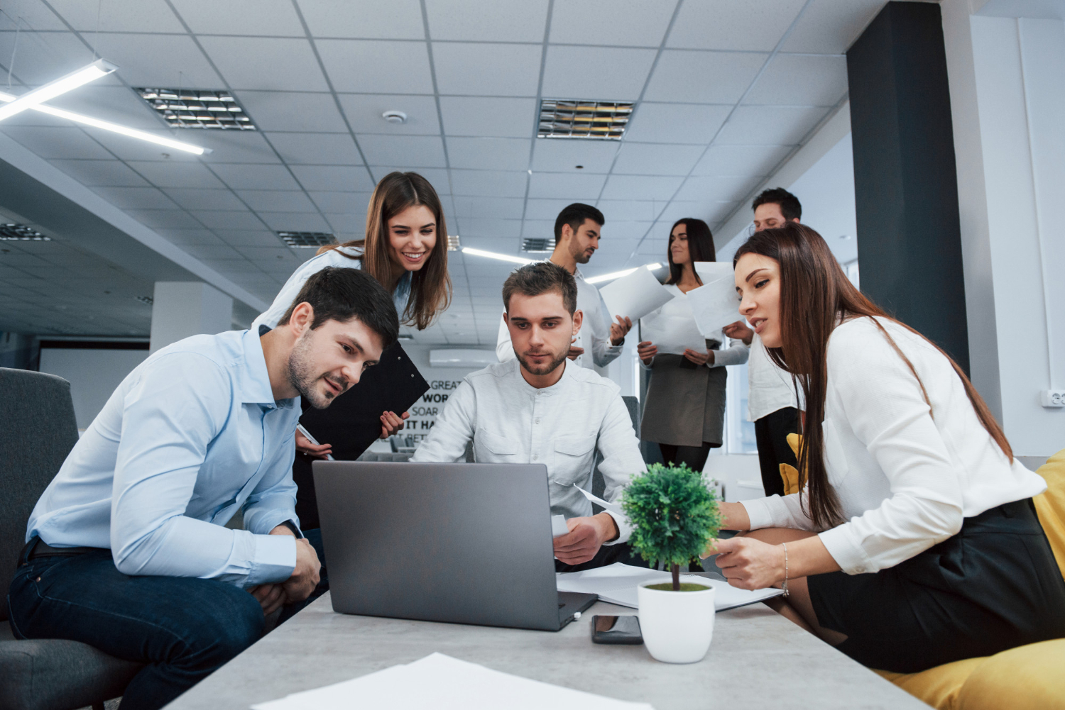 people working in an office - How To Dissolve An LLC In Alabama 