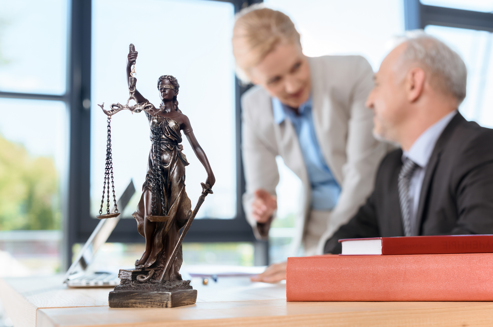legal expert with man - how to dissolve an llc in delaware