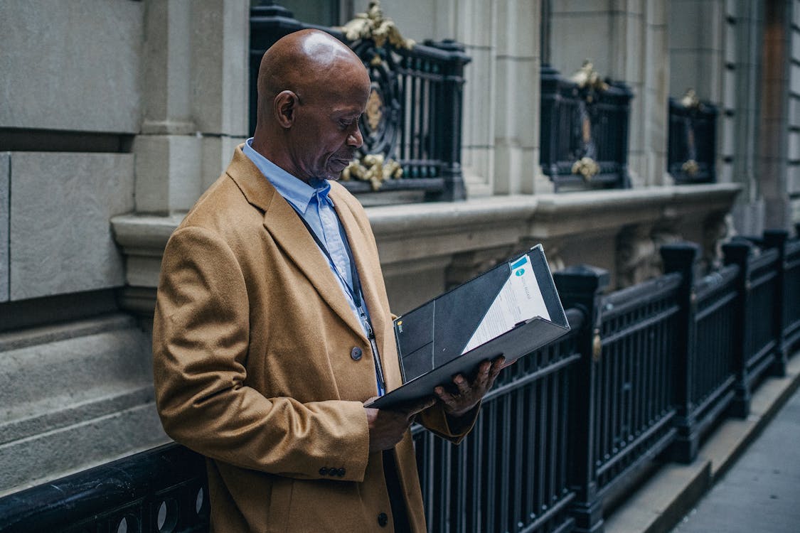 man in a long coat - How to Dissolve an LLC in Idaho