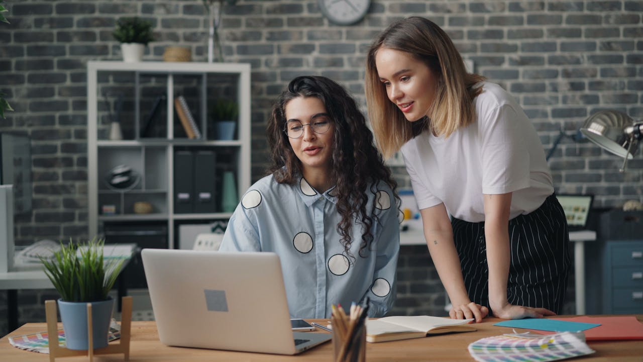 women using a laptop - How to Dissolve an LLC in Idahop