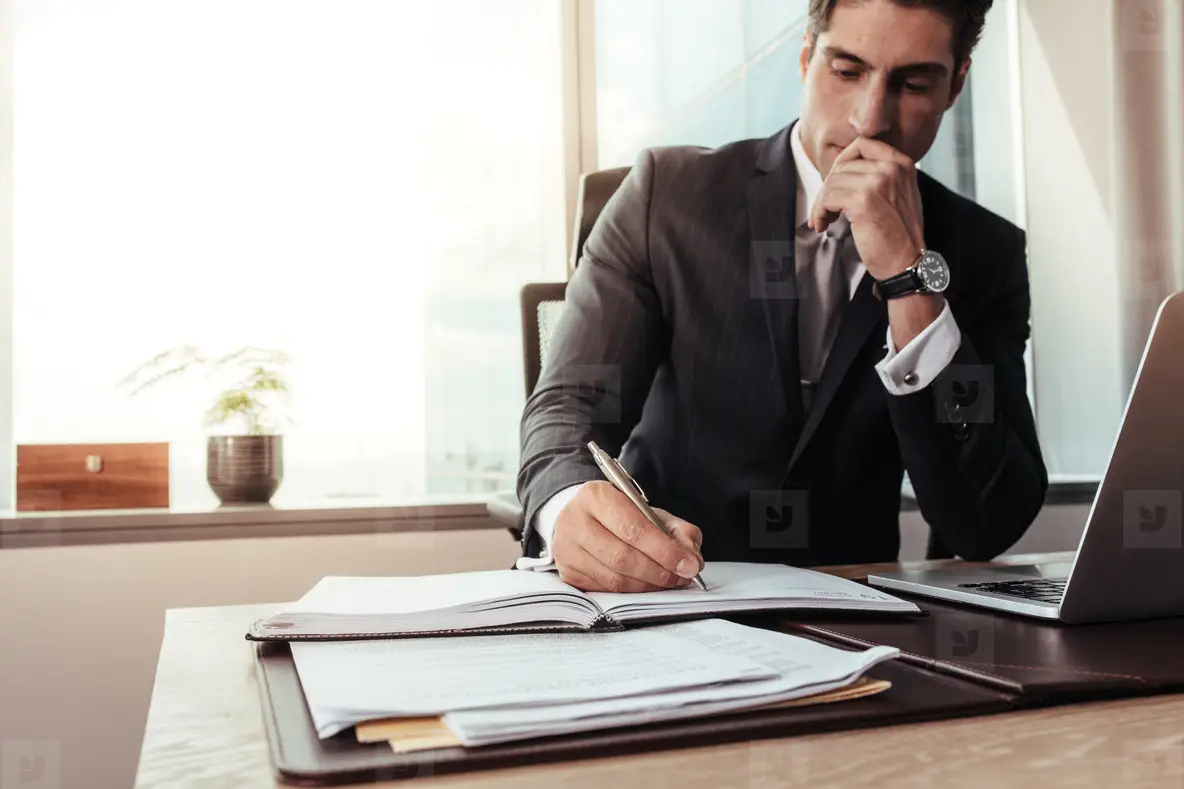 Founder signing document - How to Dissolve an LLC in Illinois