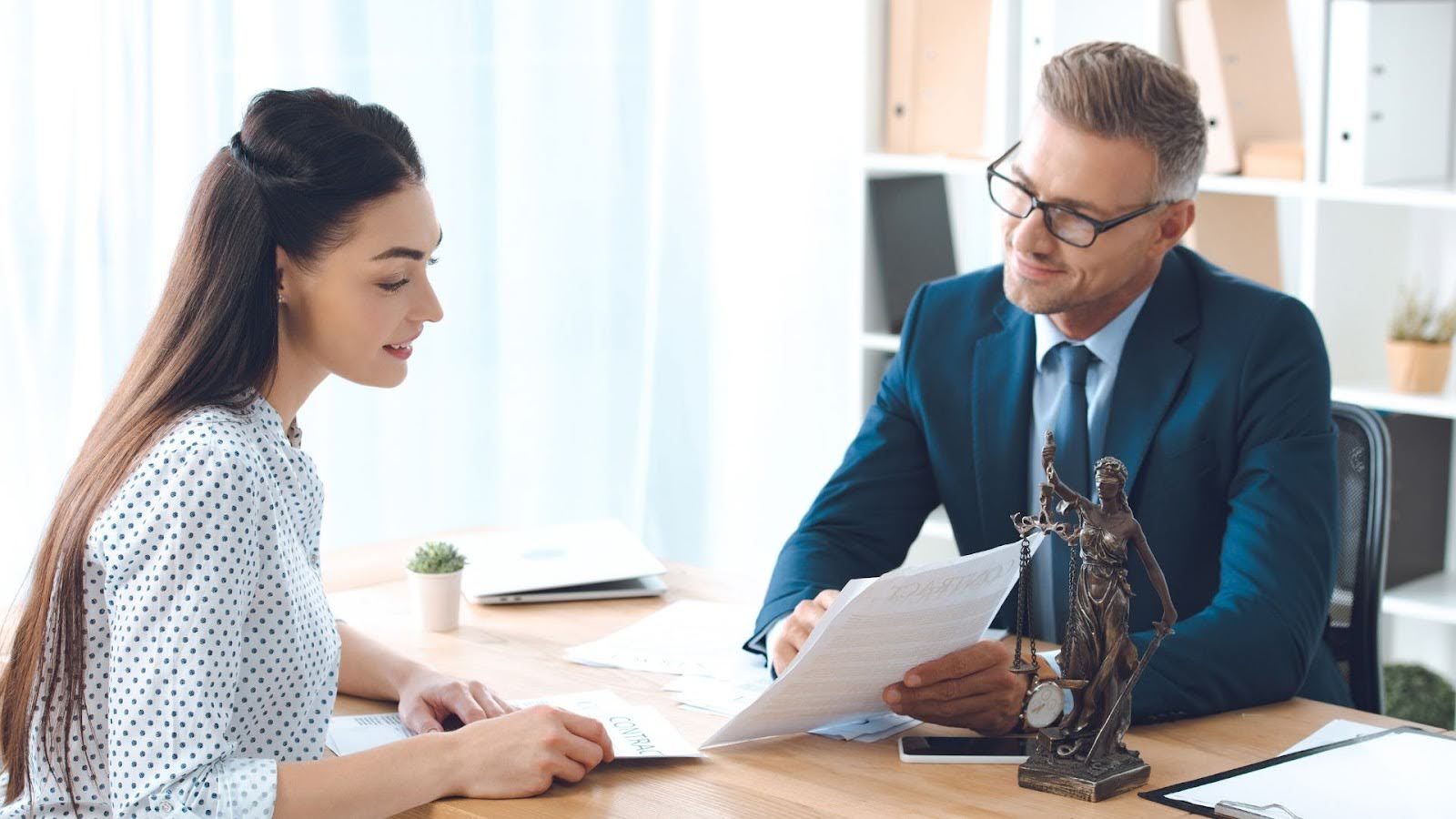 person showing work - How to Dissolve an LLC in Maine