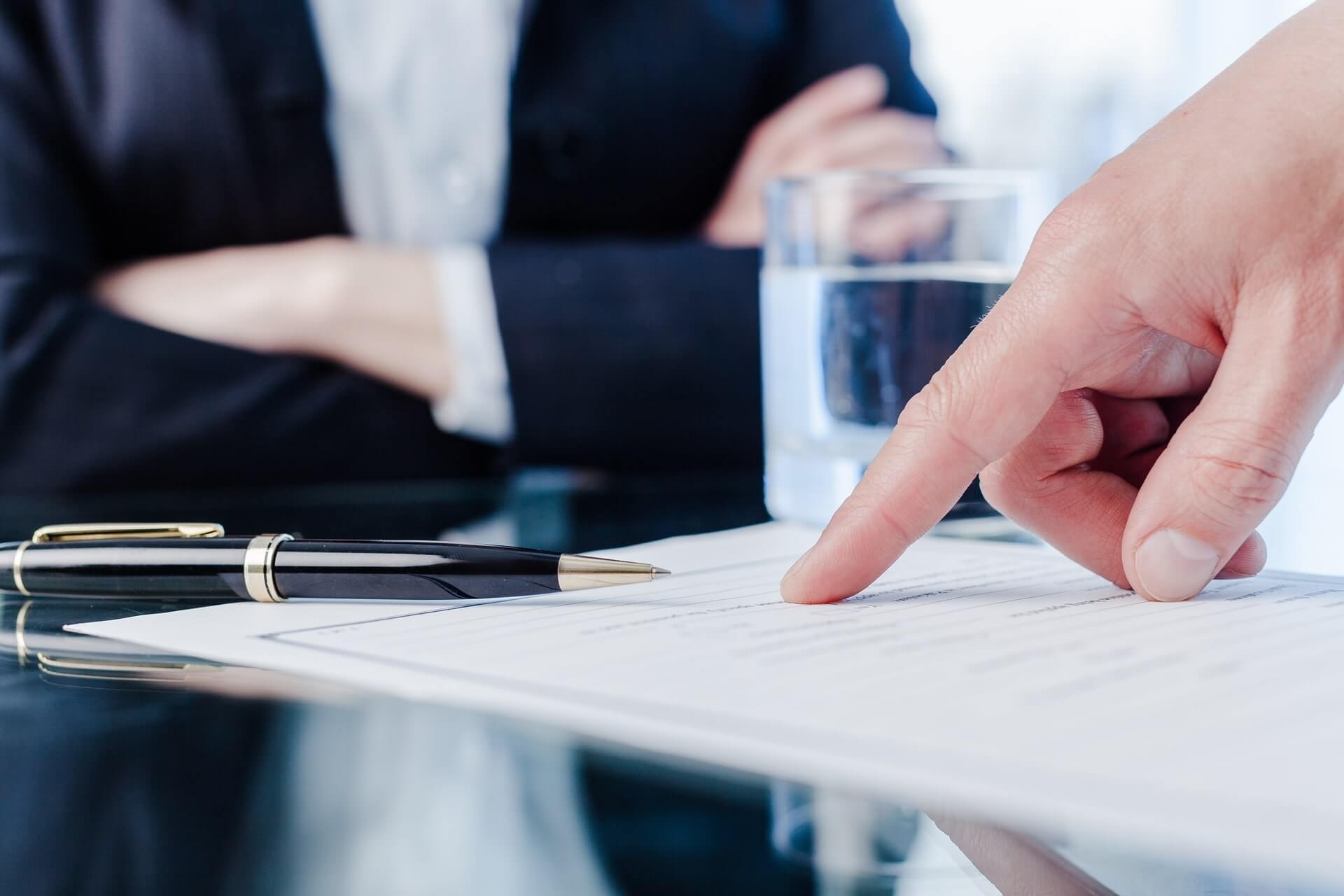 person pointing - How to Dissolve an LLC in New Jersey