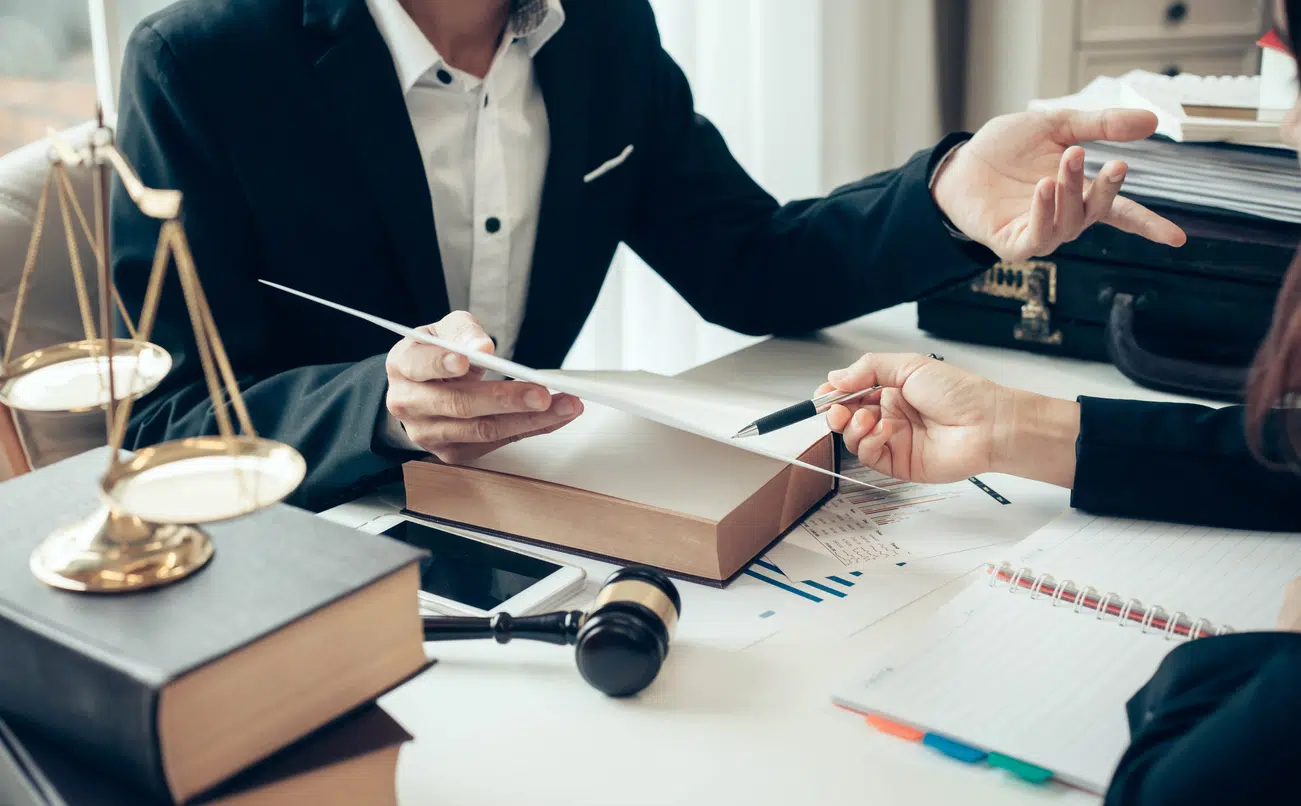 person with team - How To Dissolve An LLC In Oklahoma