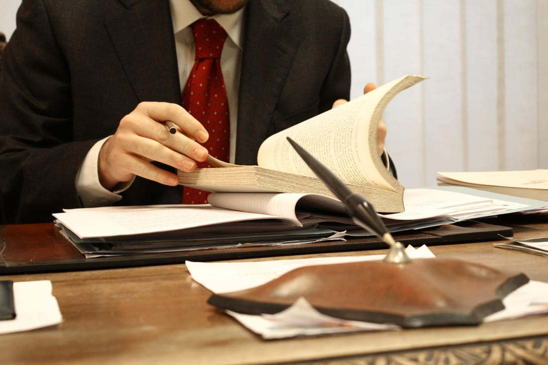 person reading - How To Dissolve An LLC In Oregon