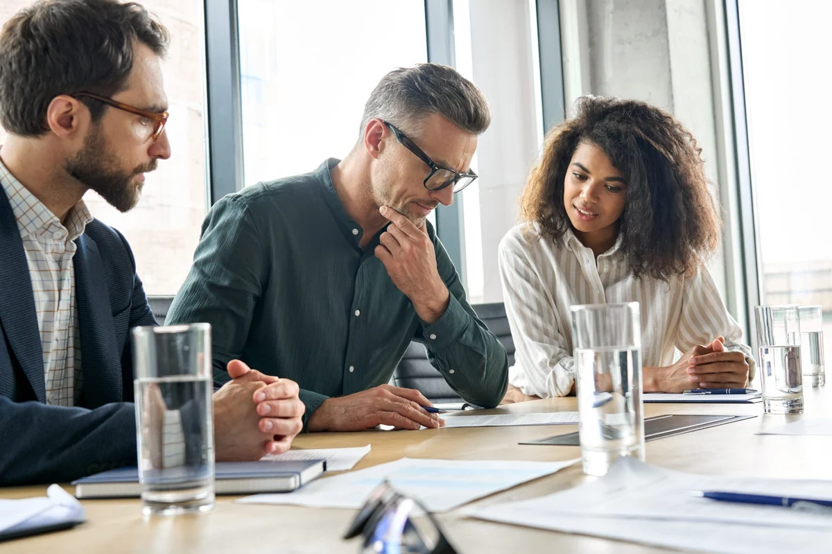 founders looking at document - How to Dissolve an LLC in Pennsylvania