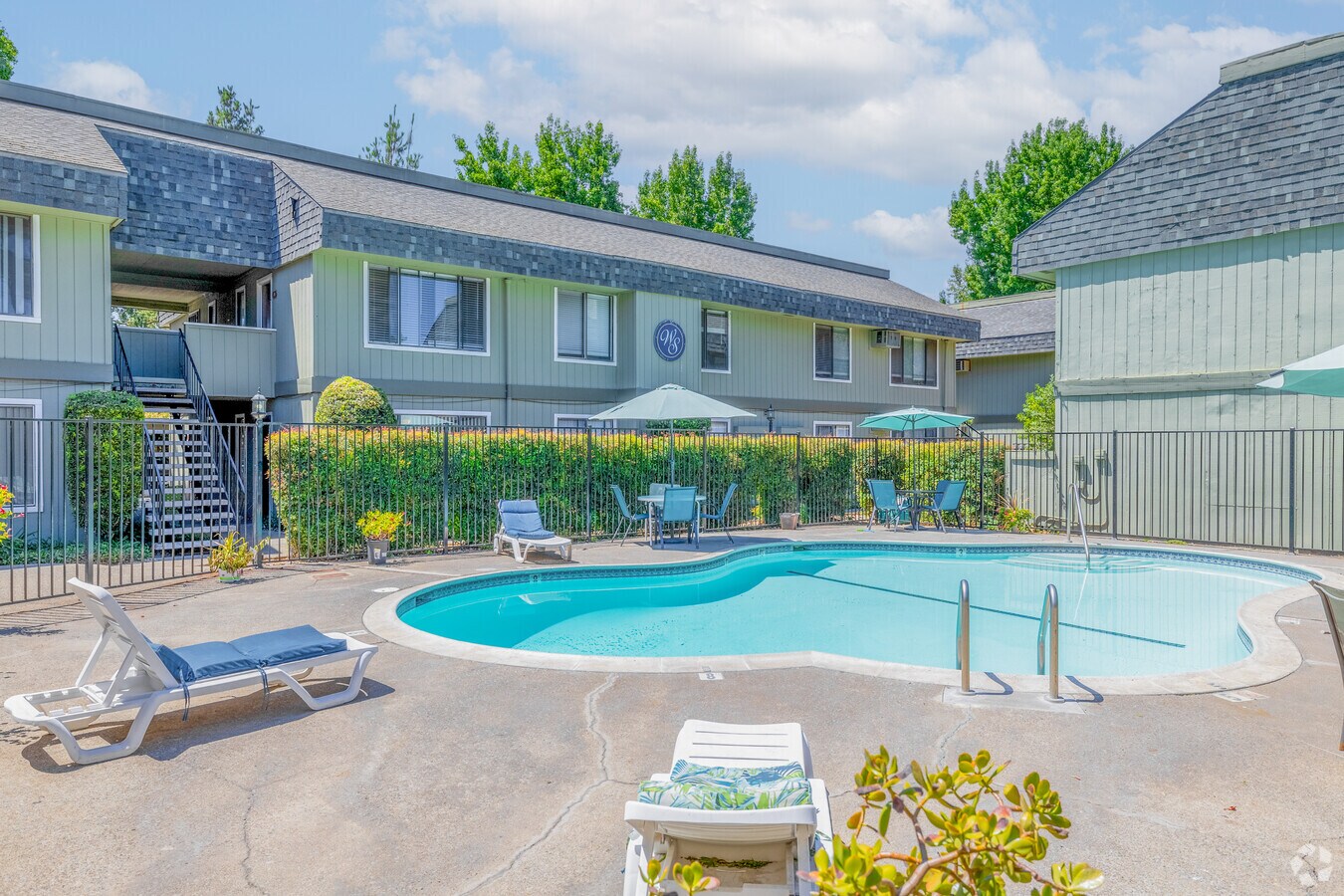 Swimming pool with lounge chairs