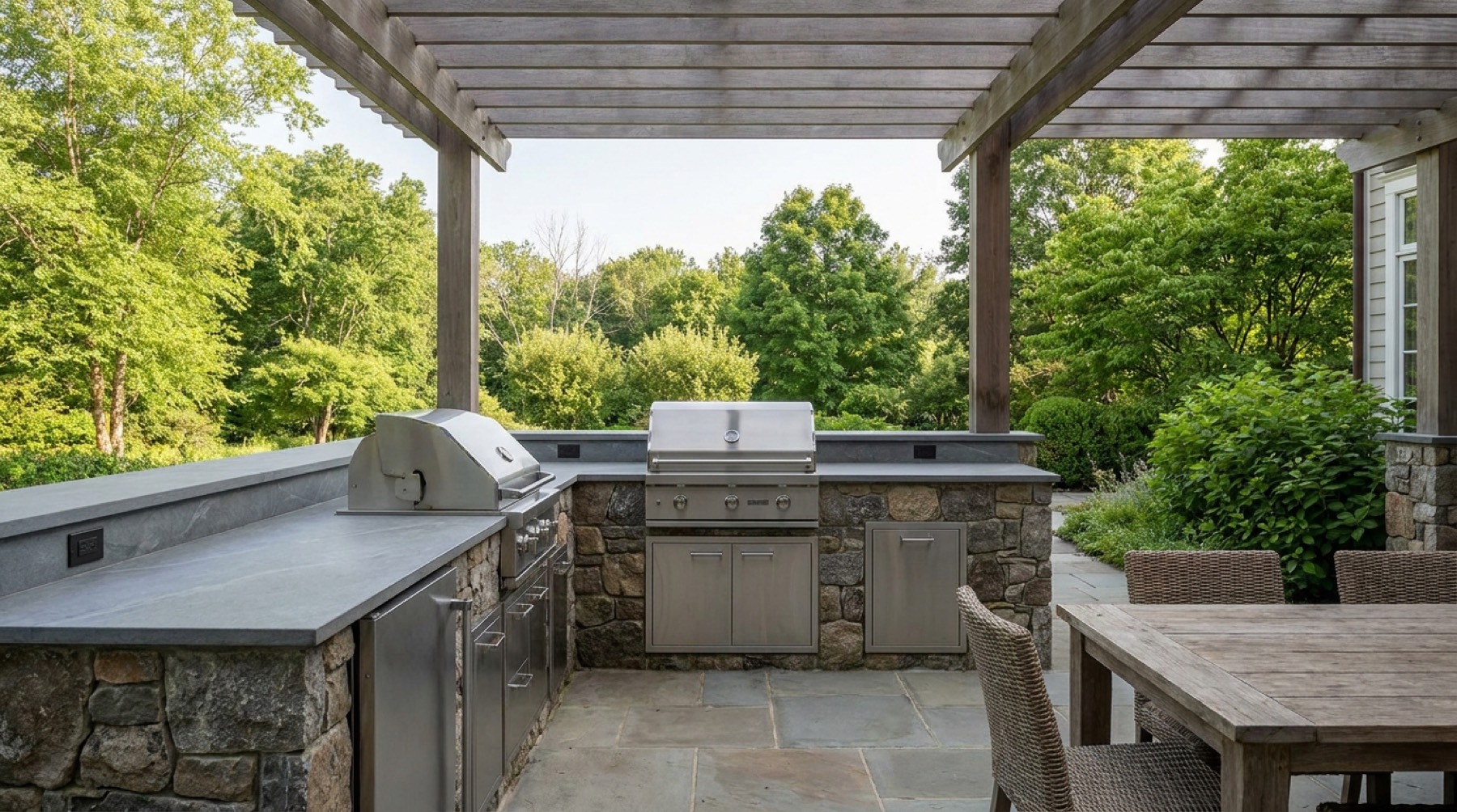 Outdoor kitchen on a covered terrace with large-format porcelain countertops