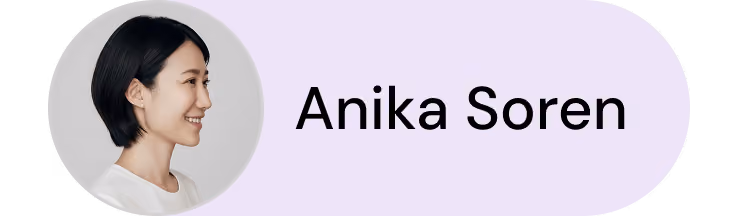 Profile photo of a woman with short black hair smiling, next to the name Anika Soren.