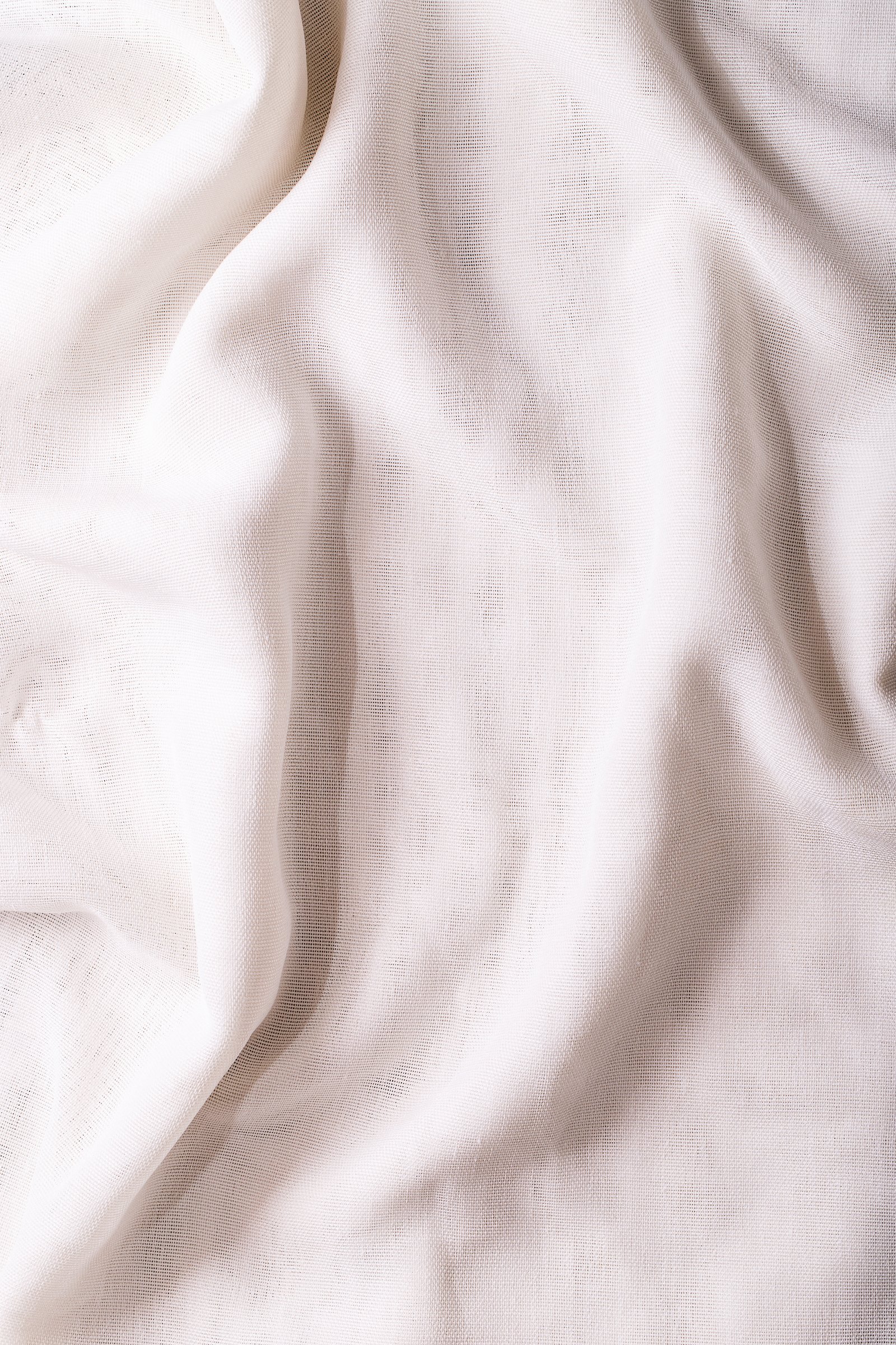 Cream linen falling in soft vertical folds