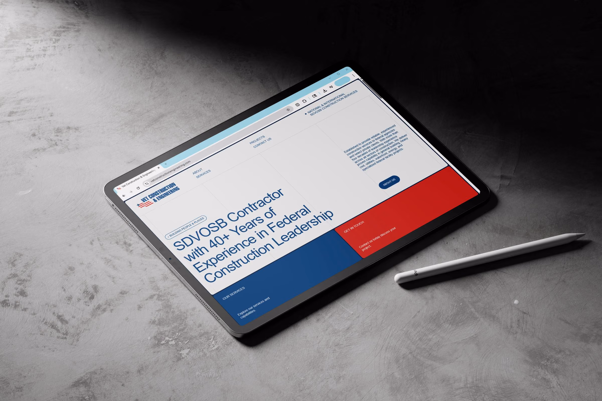Image of an ipad featuring the Vet Construction and Engineering home page