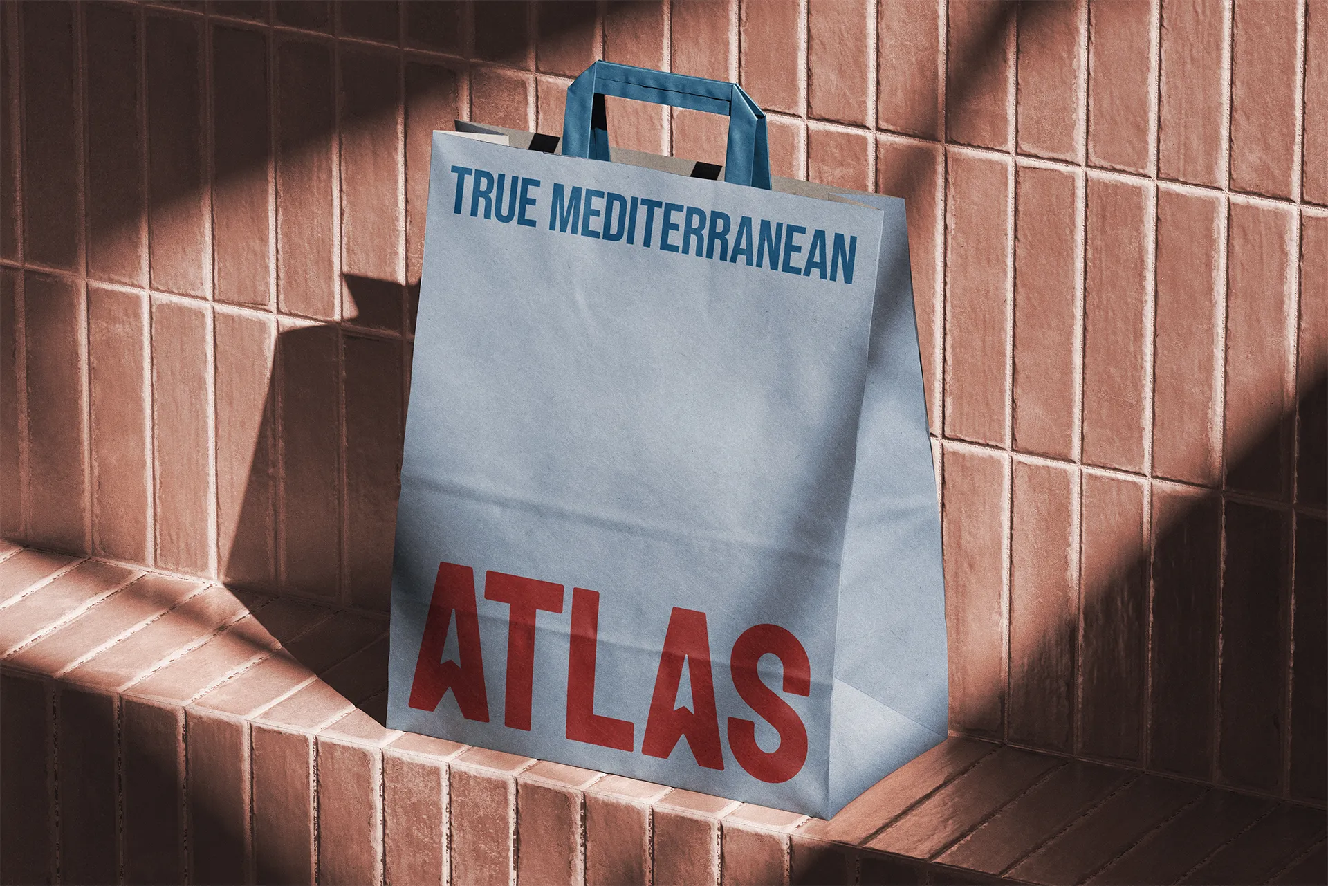 Branded to-go bag design for Atlas Mediterranean