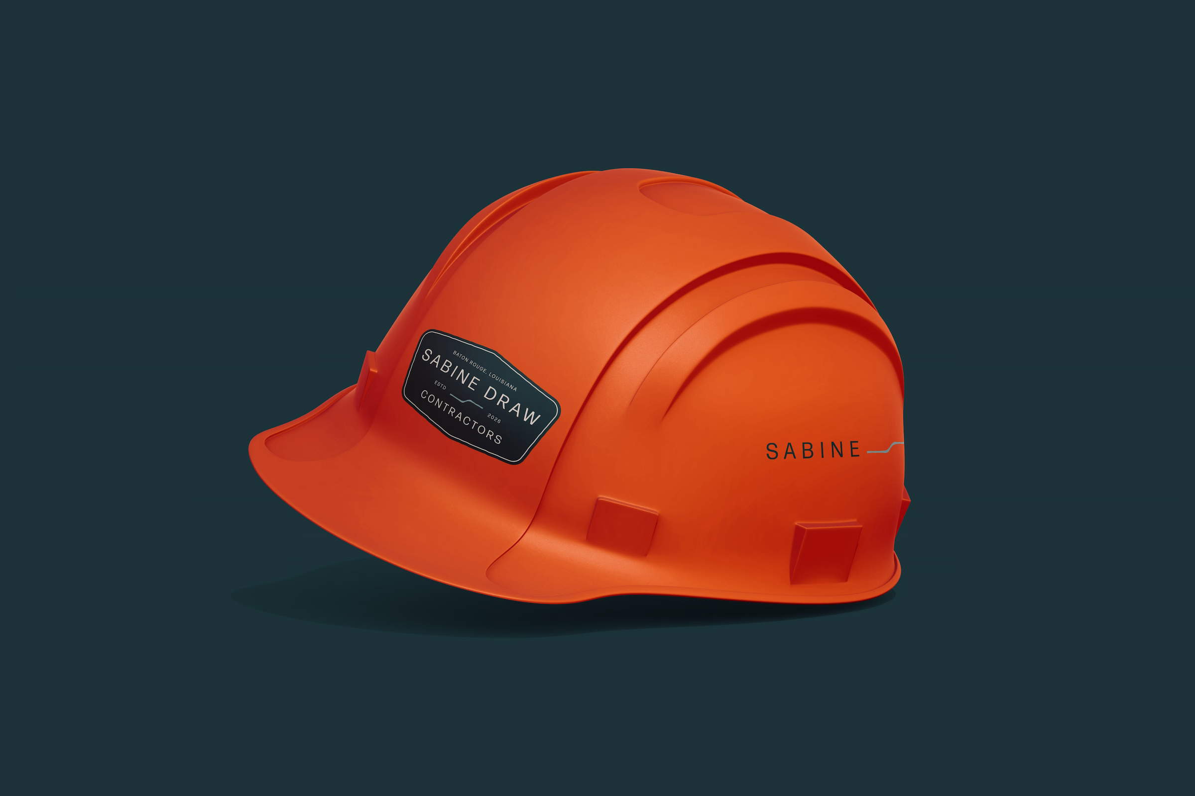 Orange hard hat featuring Sabine Draw logos