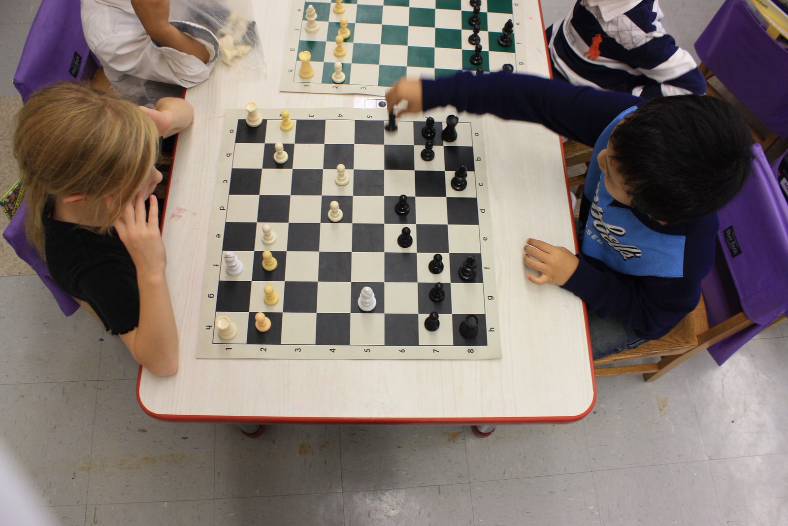 Students playing chess at Anderson