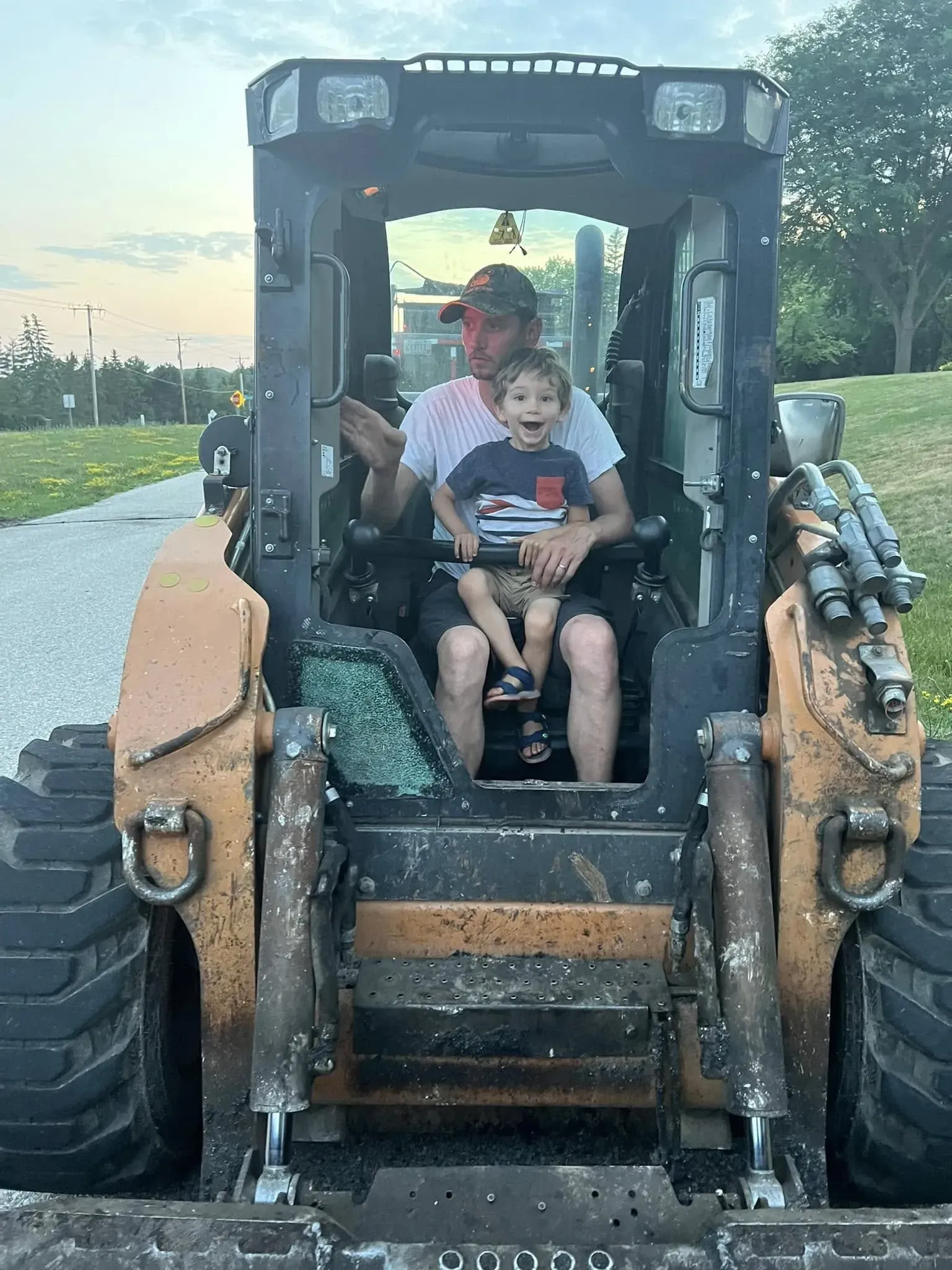 Logan Morawski with his father learning the ropes at Purpose Contracting Asphalt