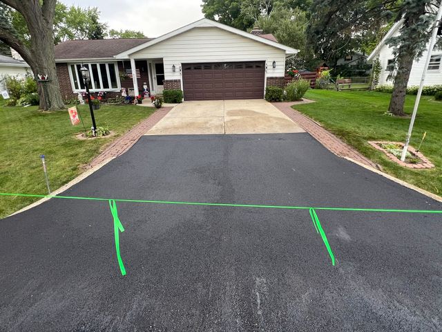 New asphalt driveway at a Southeastern Wisconsin home