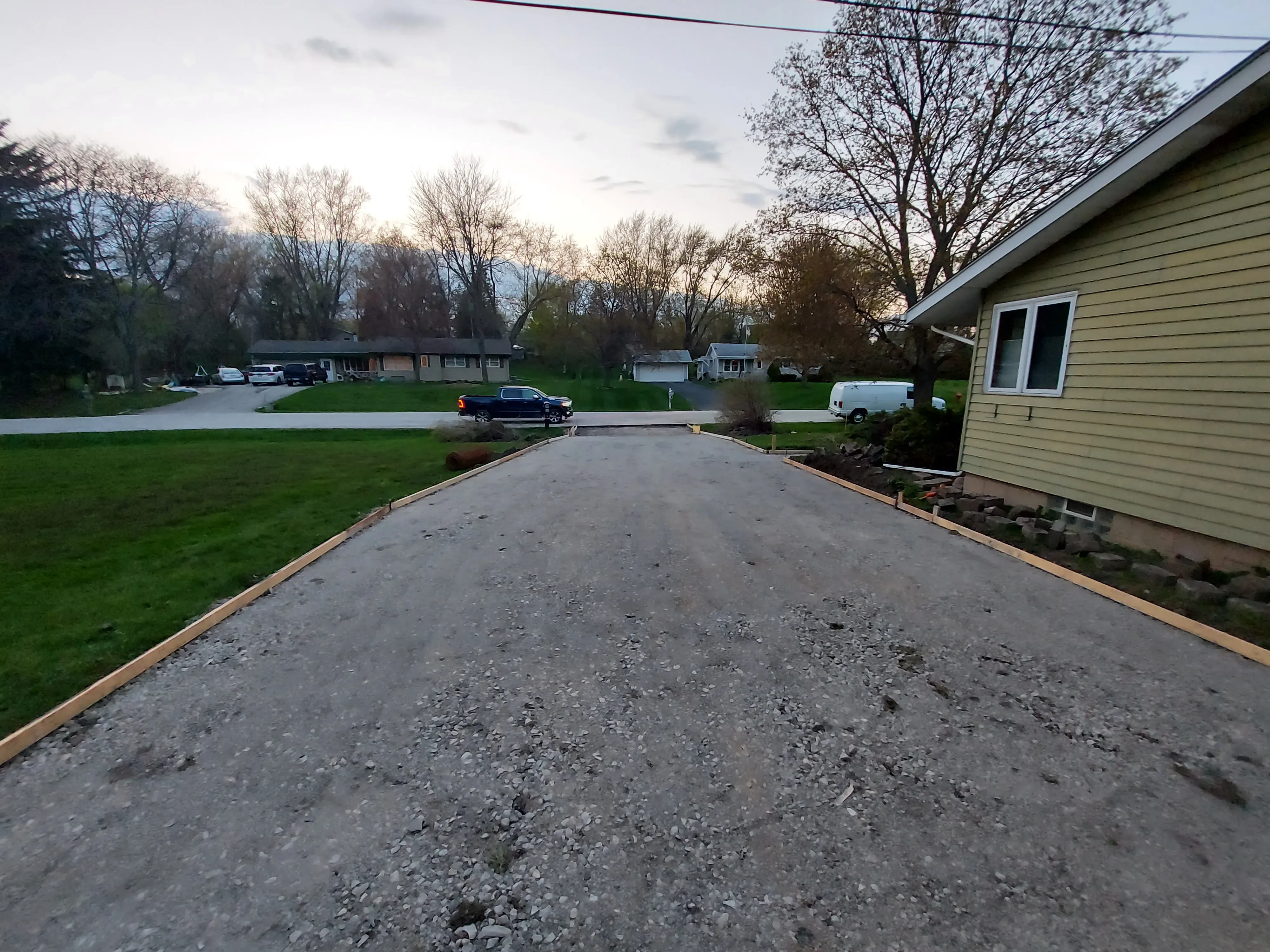 Paving area staked out and marked on site to define the scope of the work