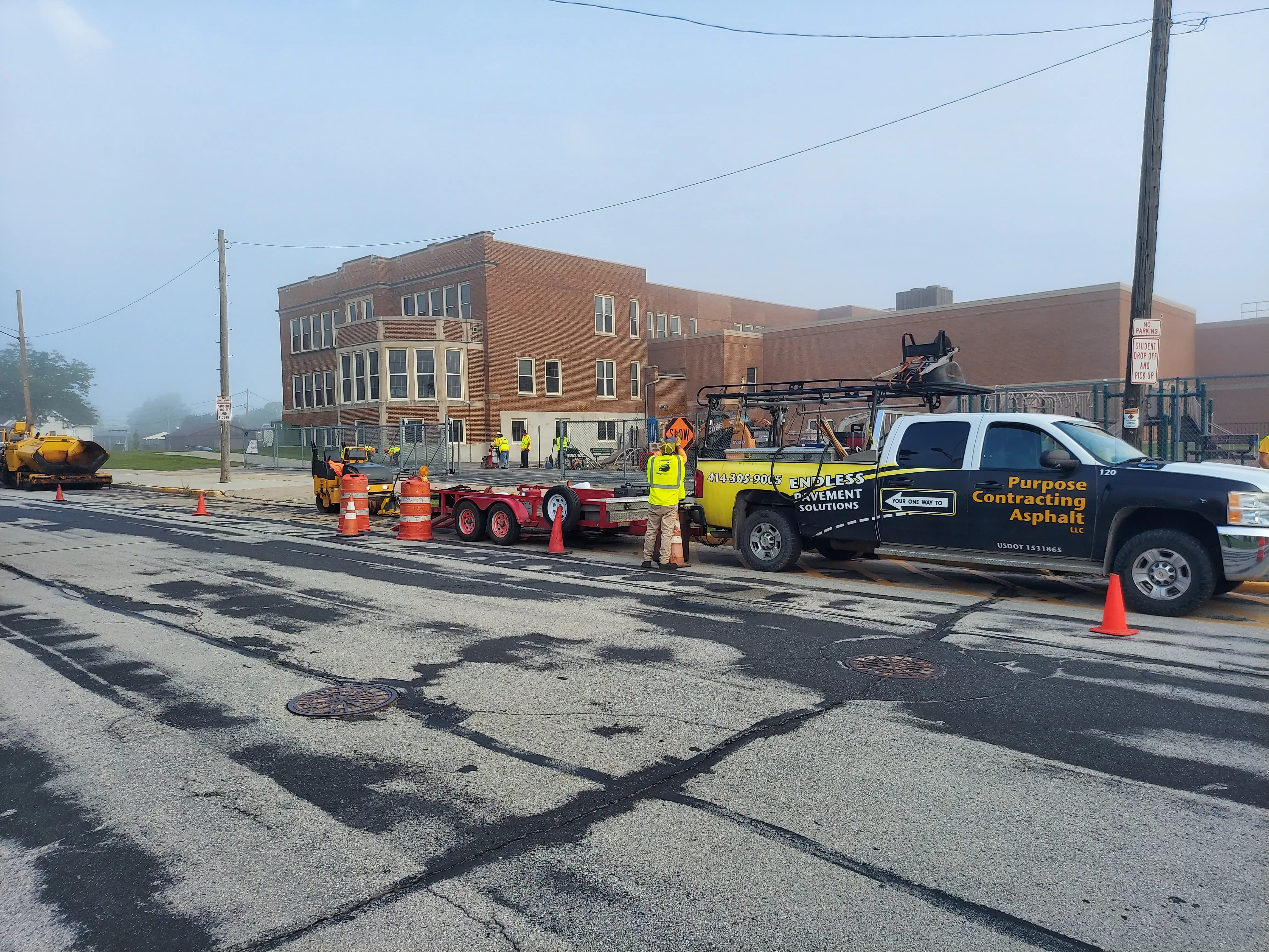 Purpose Contracting Asphalt truck on a job site