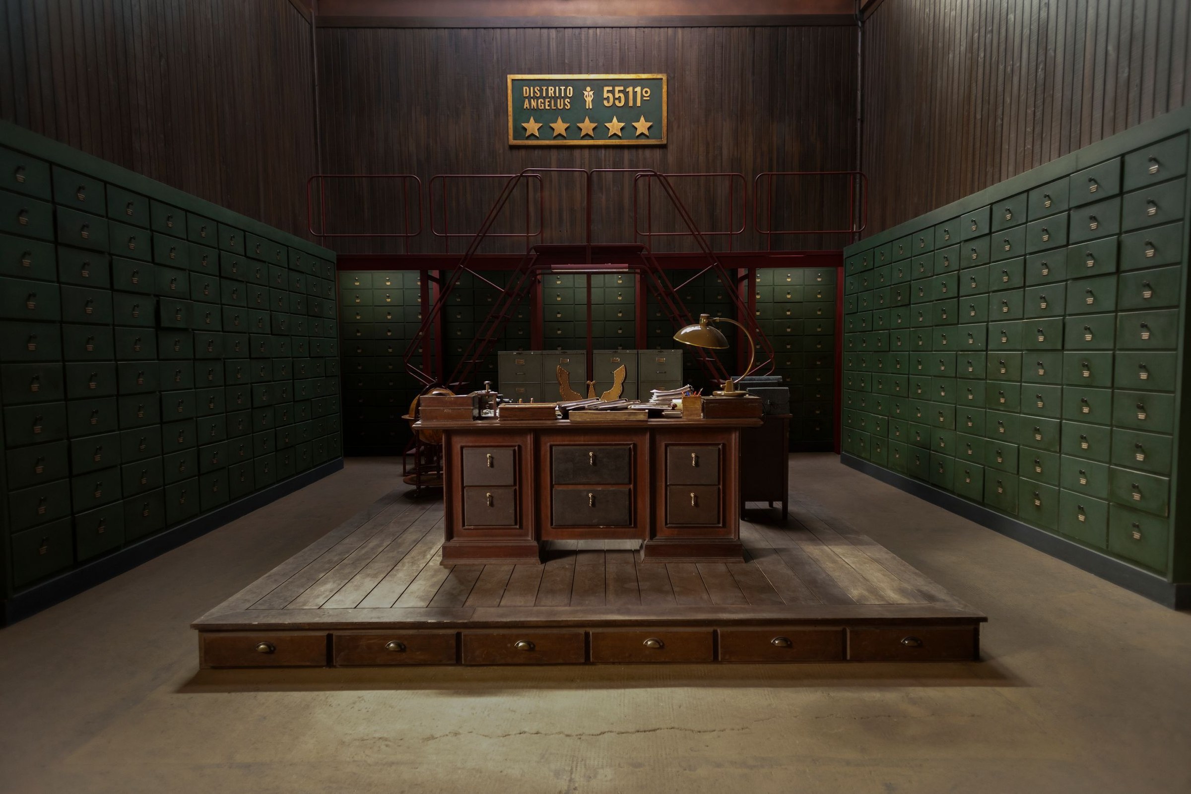 Netflix · 2019 · Nobody's Looking — Still from the series (© Netflix): the Angelus office, the desk on its dais.