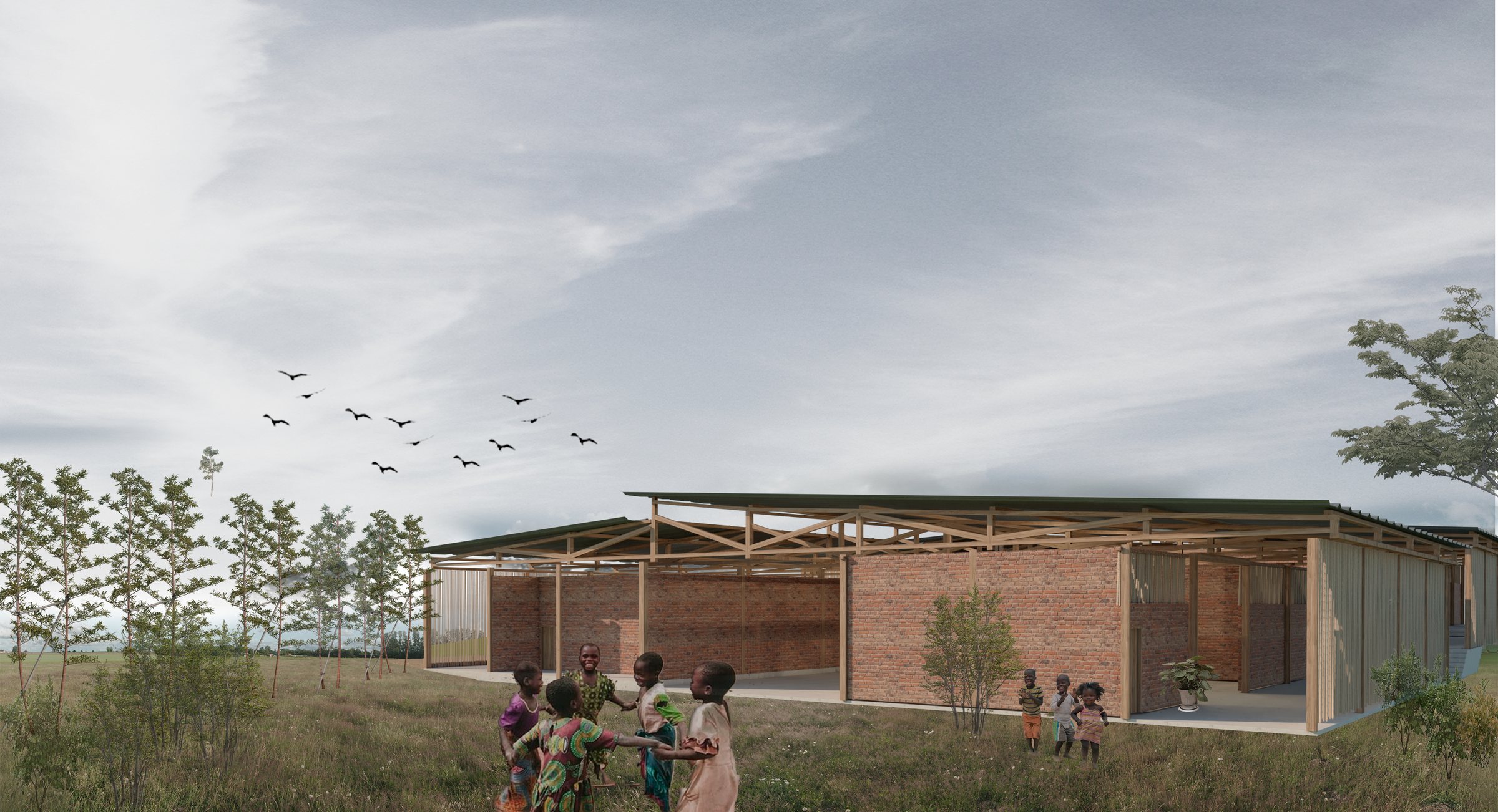 The school seen across the field: low brick volumes under a single continuous metal roof, with children gathered in the grass in the foreground.